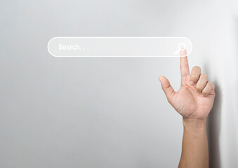 Wall Mural - searching information data on internet networking concept. hand of man touching magnifying glass ico