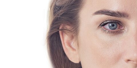 dry eye syndrome, female red eye with inflamed vessels close-up on a white background