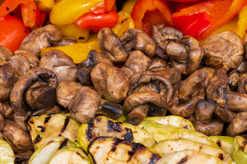 Close up of fried mushrooms for sale at the international street food festival, selective focus. Background