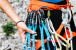 © ADDICTIVE STOCK - Faceless mountaineer holding climbing equipment in forest
