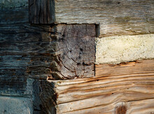 A Box Joint On A Weathered Log Cabin.