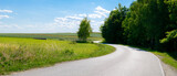 Fototapeta Miasto - winding road among the pol