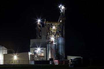 Industrial factory building illuminated at night