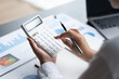 © PaeGAG - Data Analysis for Business and Finance Concept. Businessman Accounting Calculating Cost Economic Financial data.