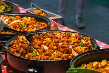 Wall Mural - Chinese cuisine on display at Brick Lane Market in London