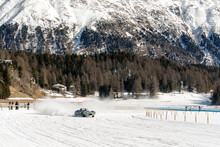 Classic Vintage Car On The Frozen Lake Of Saint Moritz In A Race