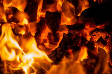 Close Up Photo On Red Coals In Burning Bonfire