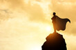 © Midnight Studio - silhouette of superhero businessman on hill Sky with bright sunlight. Successful business ideas, outstanding leadership skills. achievements and goals