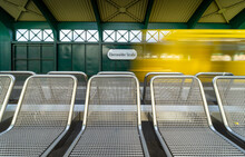 Close-up Of Empty Seats In Subway Station