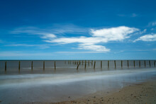 Long Exposure View Of Old Abandoned Sea Defenses On Happisburgh Beach