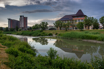 Wall Mural - Romania, Bistrita, School near the Bistrita River in June 2022