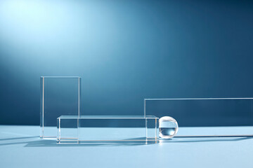 Front view of transparent podium glassware decorated in blue background with blank space