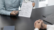 © Puwasit Inyavileart - Employer or HR department is reading the resume and interviewing the ability of new employees, job interview with applicants, Using psychology in job interviews, Employment and Recruitment Concept.
