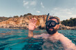 Man snorkelling in the mediterranean sea