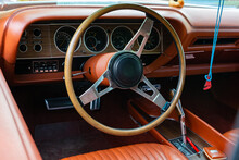 View Of The Steering Wheel And Dashboard Of An Old Vintag Car. Retro Car Dashboard Interior.