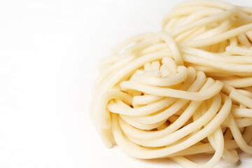 close up ramen or soba noodles on white background with copy space                           