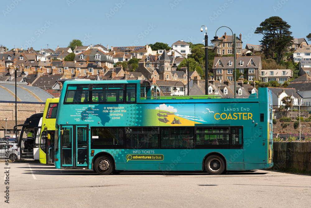 Penzance, Cornwall, England, UK. 2022.Penzance bus station with buses lined up in a holding area before going into service.