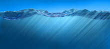 Ocean Water Line With Ripples And Sunrays Underwater