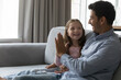 © fizkes - Happy little girl give high five to Hispanic dad. Loving father spend leisure time with daughter, talking, express support, praising with hand gesture, showing approval, congratulate, make bet concept