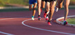 © pavel1964 - Athletics people running on the track field.Running a race on a track for sports competition and winning