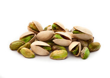Pistachio Nuts. Many Pistachios Isolated On White.