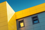 Fototapeta  - Urban Contemporary architecture on a clear day. Close up of a multicolored office building in the city.