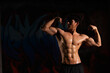 © CandyRetriever  - Portrait of Shirtless strong Asian sportsman athlete do sport training workout exercise bodybuilding in abandoned building. Active man bodybuilder practicing muscular strength training in dark old gym