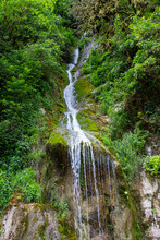 Gegsky Waterfall In The Forest. Abkhazia