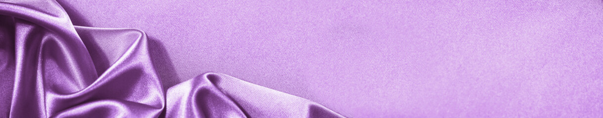 Wall Mural - Purple pink silk satin background. Soft folds. Shiny fabric. Luxury lilac background. Space. Design. Web banner. Wide. Website header. Flat lay. Table top view. Birthday, wedding, Christmas, Valentine