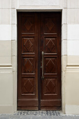 Wall Mural - View of building with vintage wooden door. Exterior design