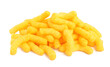 Many tasty cheesy corn puffs isolated on white