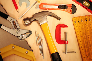 Wall Mural - Assorted work tools on wood