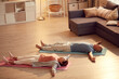 © Mediaphotos - Tired senior couple lying with outstretched arms on floor while relaxing into Shavasana