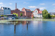 Muehlendamm with the building of the old mill and the water level gauge in Brandenburg an der Havel, Germany