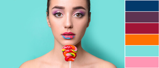 Canvas Print - Beautiful young woman with creative makeup and lollipop on turquoise background. Different color patterns