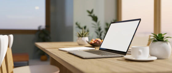 Wall Mural - modern home workplace with notebook laptop and decor on wood dining table in living room