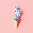 Creative idea. Ice cream umbrella on pink background. Summer concept minimal. 3d rendering