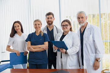 Wall Mural - Portrait of a group of happy and successful doctors and nurses in hospital