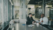 © silverkblack - Two optimistic male entrepeneurs in formal clothes discussing their startup project in cafe. African American and Caucasian businessmen talking and sitting at the table with laptop and charts
