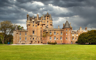 Poster - Glamis castle in scotland with dramatic sky