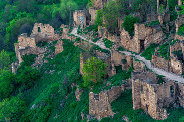 Wall Mural - aerial view of the former street among the ruins in the abandoned mountain village of gamsutl in Dagestan