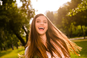 Canvas Print - Photo of pretty cheerful young lady toothy beaming smile enjoy spend free time walk outside