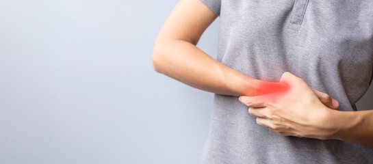 woman holding her wrist pain because using smartphone or computer long time. De Quervain s tenosynovitis, Intersection Symptom, Carpal Tunnel Syndrome or Office syndrome concept