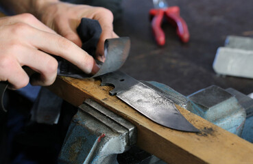 Knife production, sanding is done here