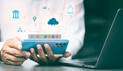 Wall Mural - a young businessman is using a cell phone to encrypt,