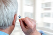 © JPC-PROD - Hearing aid in a senior man