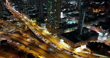 Wall Mural - Kowloon City, Hong Kong Drone fly over Hong Kong city at night