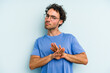 © Asier - Young caucasian man isolated on blue background doing a denial gesture