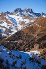 Wall Mural - The mountains of Valtellina during a sunny winter day, near the town of Sondrio, Italy - January 2022