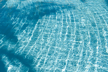 surface of blue swimming pool, background of water in swimming pool.